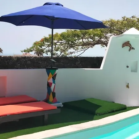 Апартаменты Aptos Con Piscina El Flamboyan 1 Тесегите